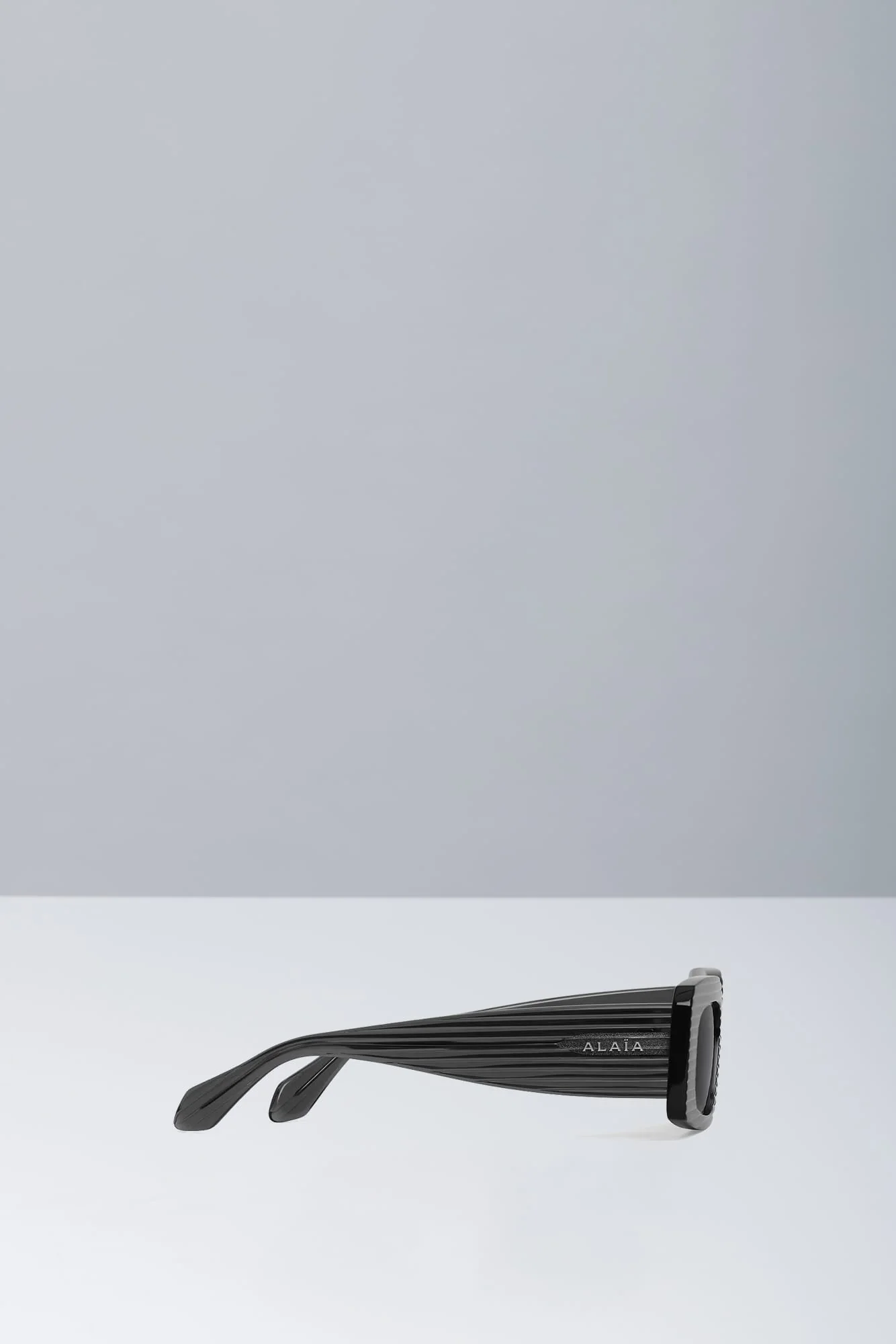 Alaïa Two Tone Black Sunglasses in Acetate - Image 2