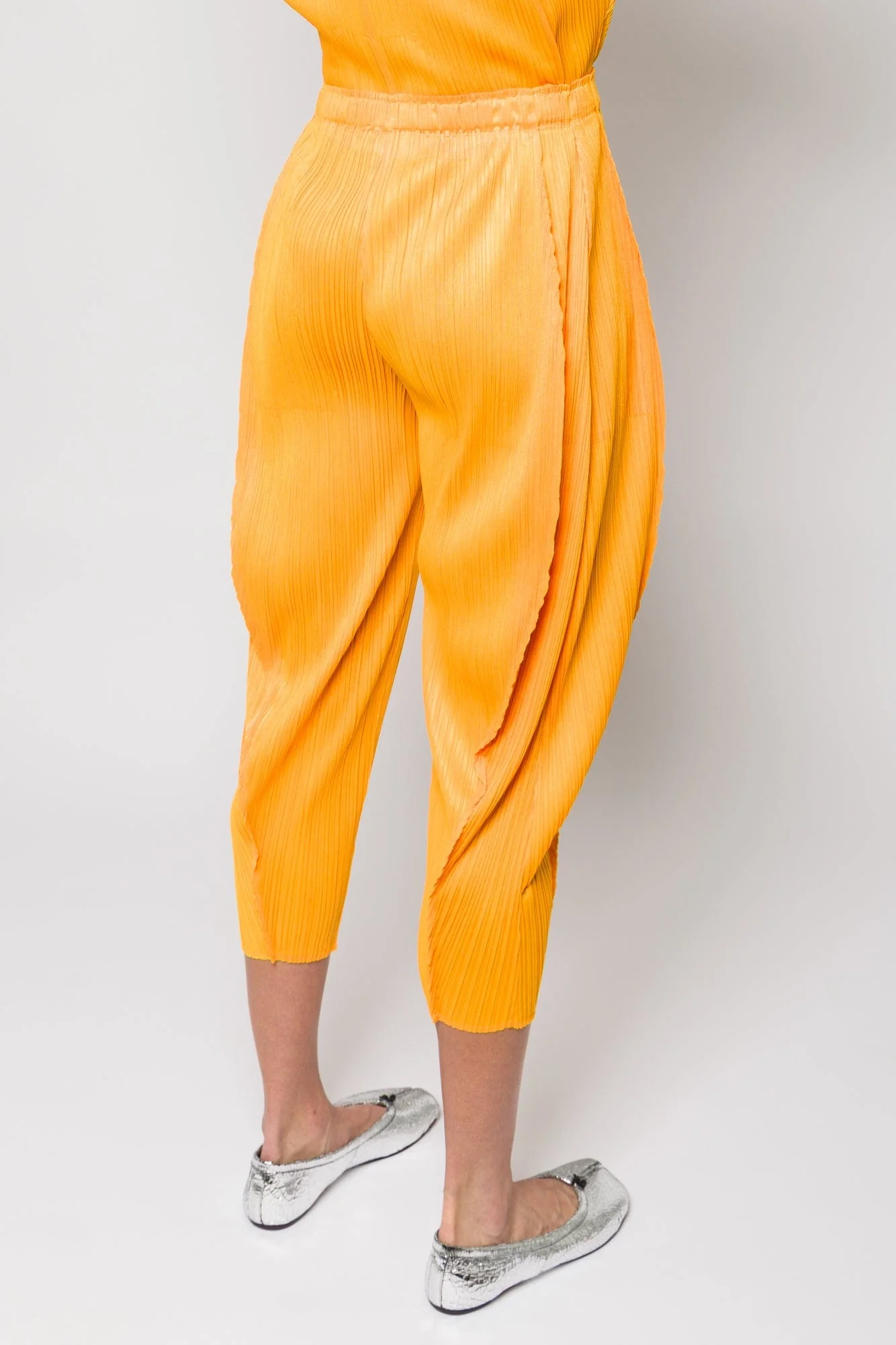 Pleats Please Issey Miyake Lantern Trousers in Orange Yellow SS25 - Image 3
